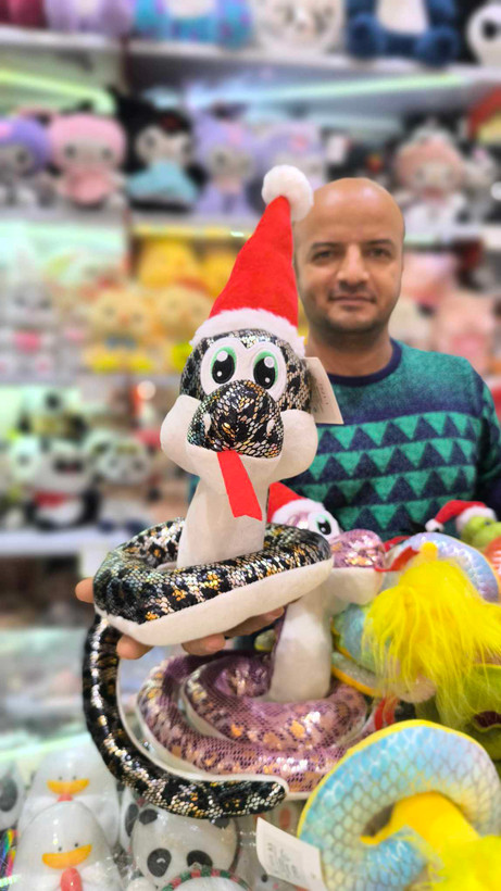 عروسک مار کلاه کریسمسی